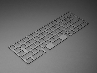 Angled shot of Black Anodized Aluminum Metal Keyboard Plate.
