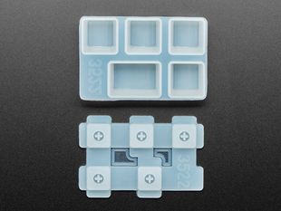 Top view of two Tab keycap molds separated.
