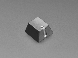 Angled shot of single black 1U R4 lamp keycap.