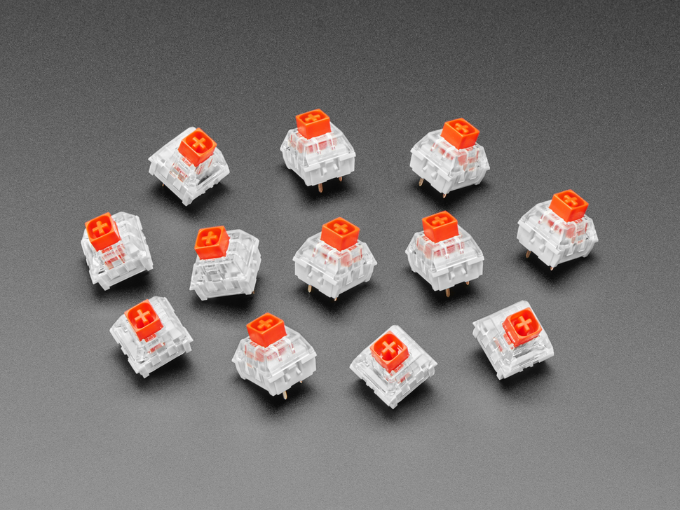 Top view of 12 red kailh key switches.