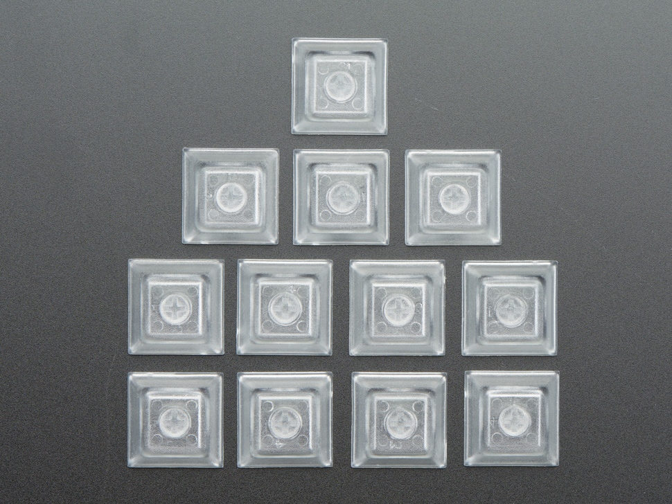 Top view of 12 clear keycaps.