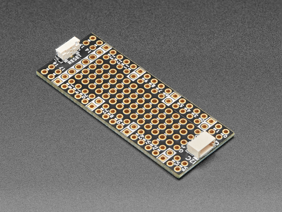 Angled shot of long, skinny prototyping breakout board.