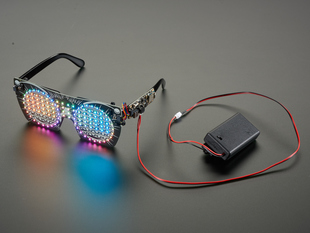 Angled shot of powered on and assembled LED glasses.