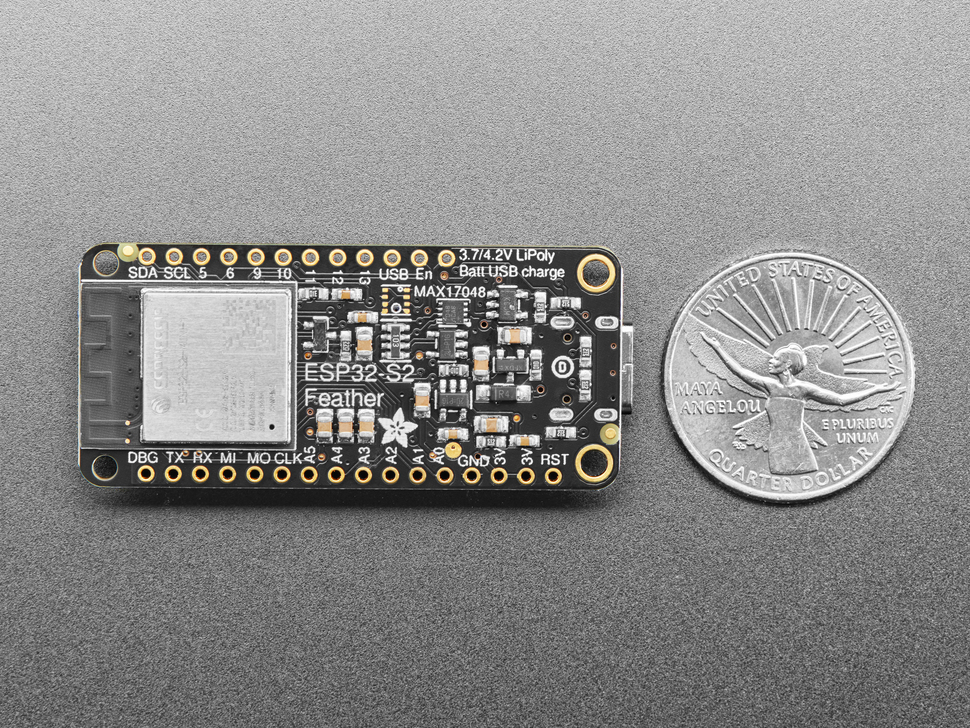 Adafruit ESP32-S2 TFT Feather measured by a US quarter 