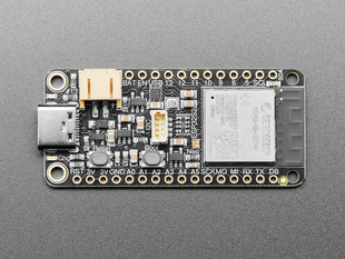 Angled view of rectangular microcontroller with WiFi module.