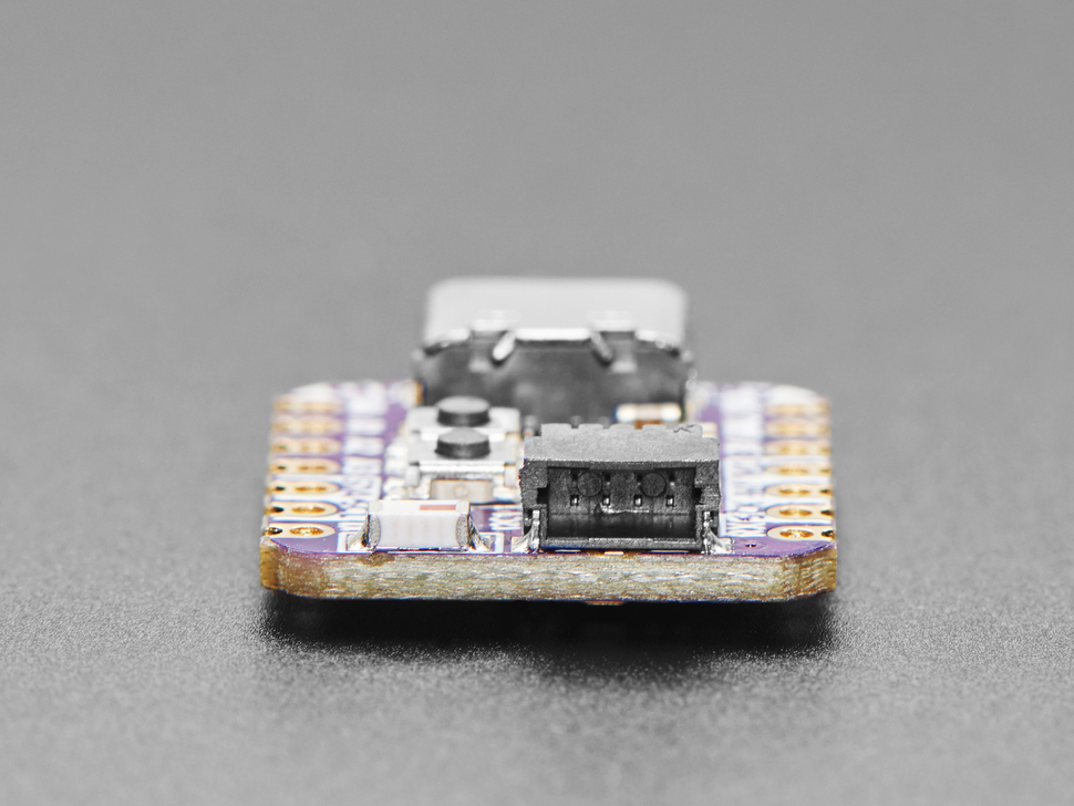 Close-up of JST-SH connector on small square dev board.