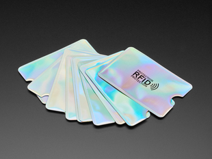 Fanned group shot of ten holographic RFID blocking card sleeves.