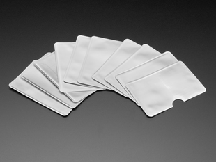 Angeld shot of ten fanned out silver RFID blocking card sleeves.