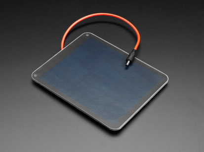 Angled shot of medium sized solar panel with power cable.