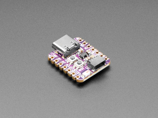 Angled shot of purple square-shaped microcontroller.