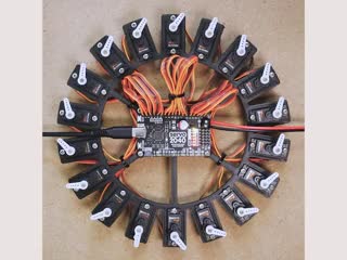 Top view video of 18 servo motors hooked up to a driver board. The servo motor fans oscillate in order. 
