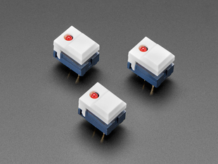 Angled shot of three white plastic step-switches with red LEDs.