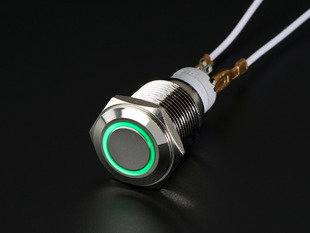 Angled shot of rugged metal pushbutton with green LED ring.