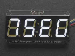 Overhead video of powered-on 7-segment display with white LEDs cycling through 4-digit numbers.