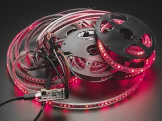 Video of eight LED strips in reels flashing red fiery colors.