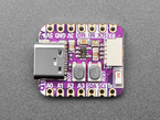 Overhead shot of purple, square-shaped microcontroller.