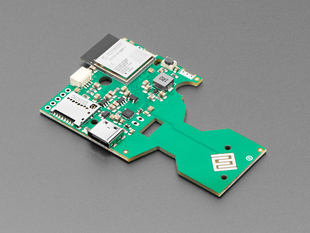 Angled shot of green prototyping board with WiFi module.