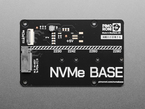 Overhead shot of black, rectangular NVME base board.