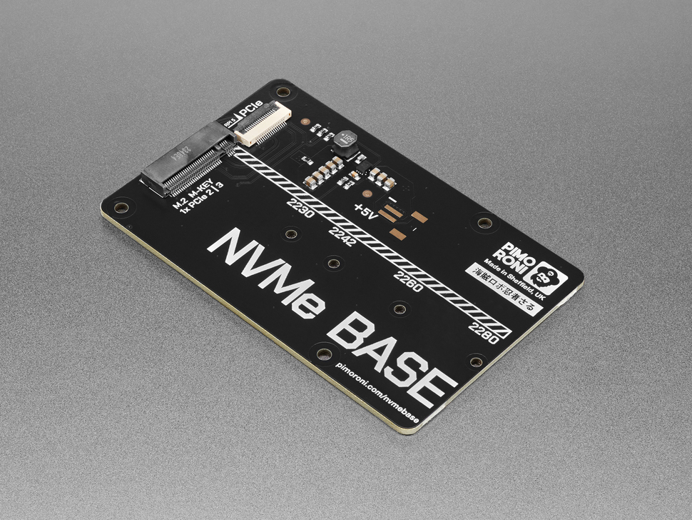 Angled shot of black, rectangular NVME base board.