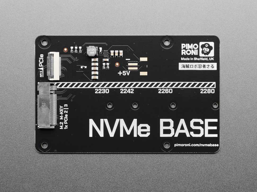 Overhead shot of black, rectangular NVME base board.