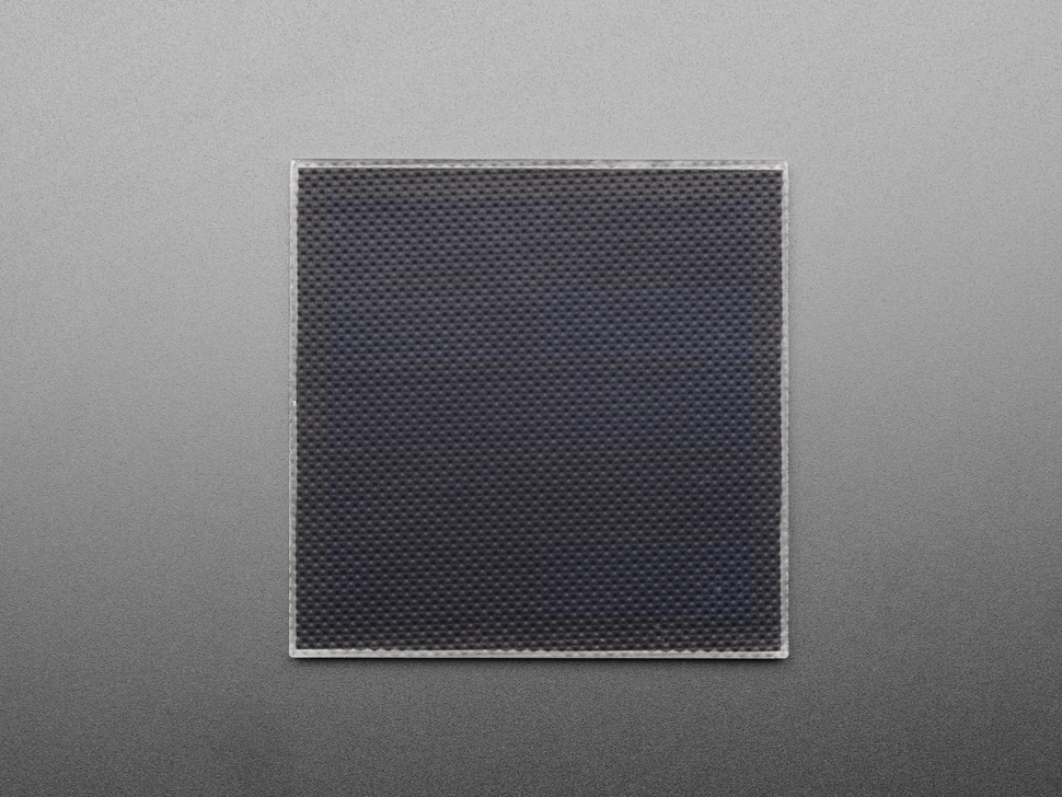 Overhead shot of medium-sized, black square solar panel.