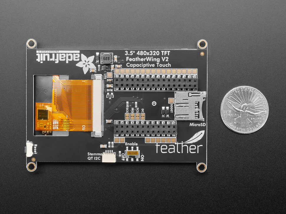 Top Down Back Shot ofAdafruit TFT FeatherWing - 3.5" 480x320 Capacitive Touchscreen next to U.S. Quarter for Scale