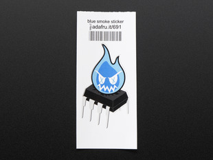 Sticker in the shape of evil blue flame over an OpAmp mounted on white paper with barcode. 
