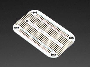 Angled shot of Adafruit Perma-Proto Mint Tin Size Breadboard PCB