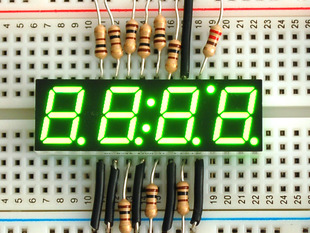 Small Green 7-segment clock display with all segments lit