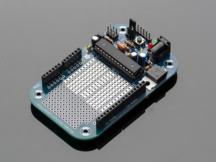 Angled shot of a Adafruit MENTA - Mint Tin Arduino Compatible Kit.
