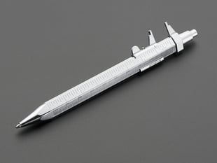 Small metal calipers built into a pen