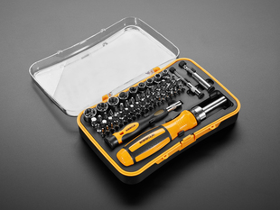 Open case of screwdriver kit with two handles and many tips and sockets