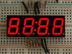 Red 7-segment clock display with all segments lit