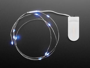 Lit coil of thin flexible wire with embedded LED 'fairy' lights attached to battery holder