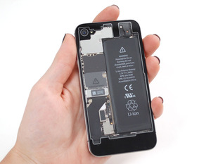 Hand holding up iphone with clear back for iphone 4s.