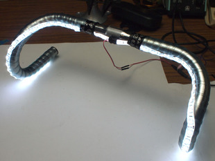 Bike drop-bars with white LEDs lining the front edges