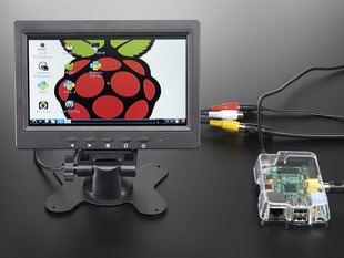 Enclosed TFT Television wired up to Raspberry Pi, showing off desktop screen.