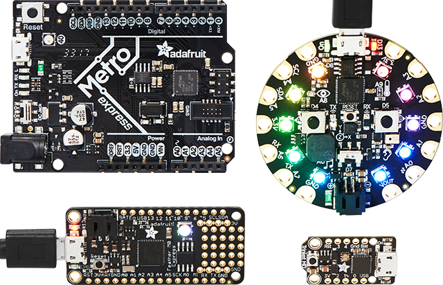 Top view of an Adafruit Metro, Circuit Playground, Feather, and Trinket