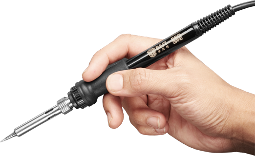Hand holding a black soldering iron